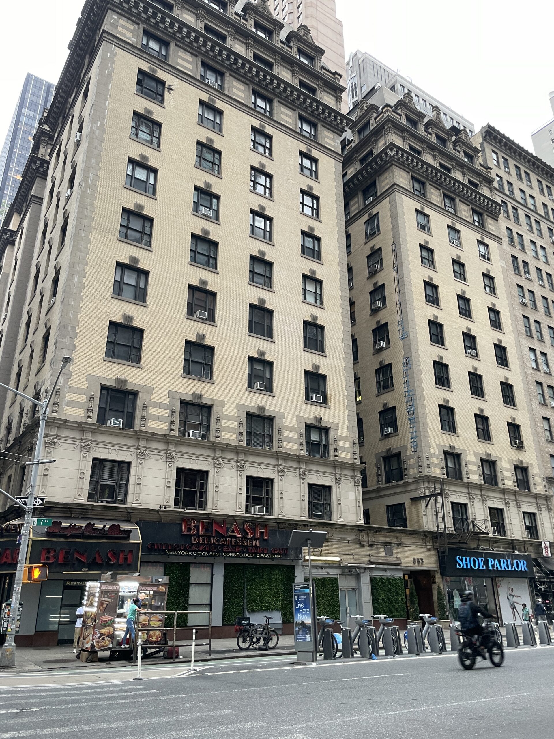 The Wyoming, 849-853 Seventh Avenue, with its facade fully visible in July 2026 after a decade under a sidewalk shed.